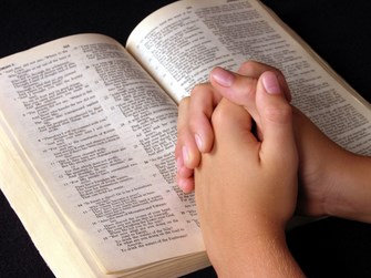 praying-over-bible Copy